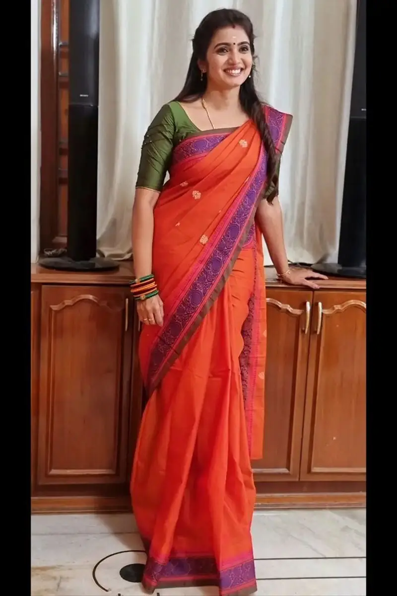 Tamil TV Actress Srithika Photos In Orange Saree Green Blouse